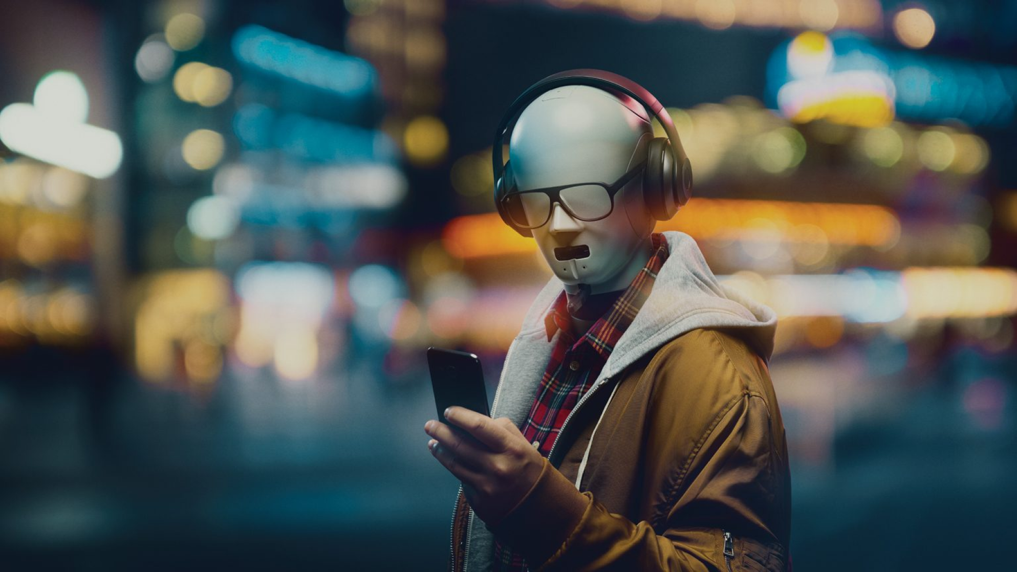 A humanoid robot wearing headphones, sunglasses, holding a smartphone in an urban setting