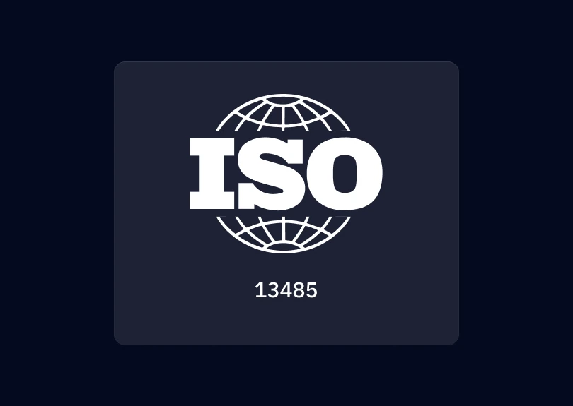 A white ISO logo with "13485" written underneath on a dark blue background